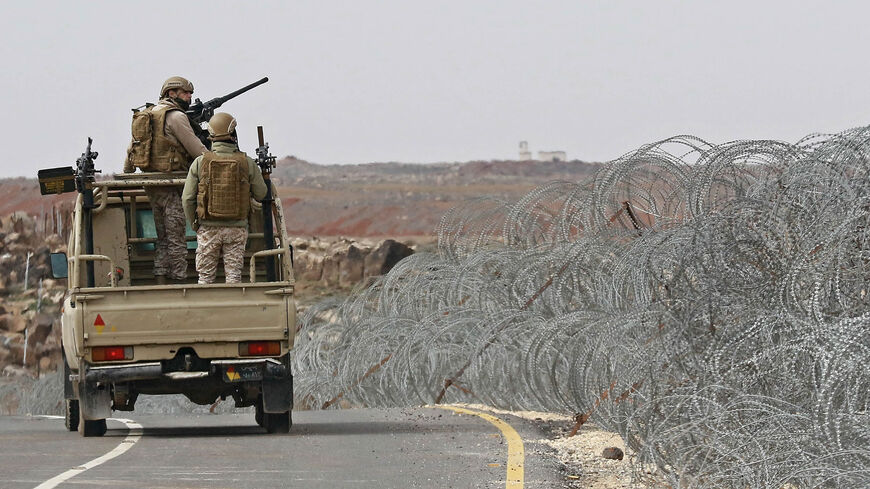 A picture taken during a tour origanized by the Jordanian army shows soldiers patrolling along the border with Syria to prevent trafficking, Feb. 17, 2022.